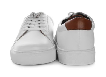 Photo of Pair of stylish sneakers on white background