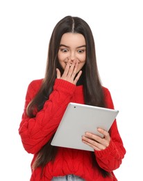 Photo of Emotional teenage girl using tablet on white background