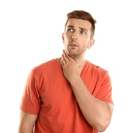 Young man with asthma on white background