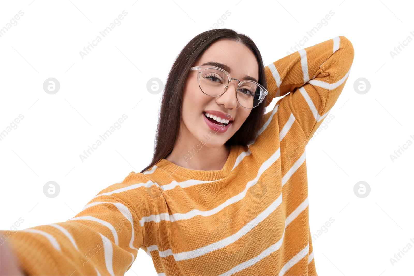 Photo of Smiling young woman taking selfie on white background