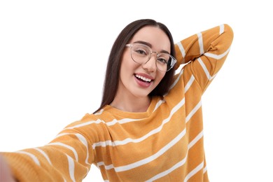 Photo of Smiling young woman taking selfie on white background