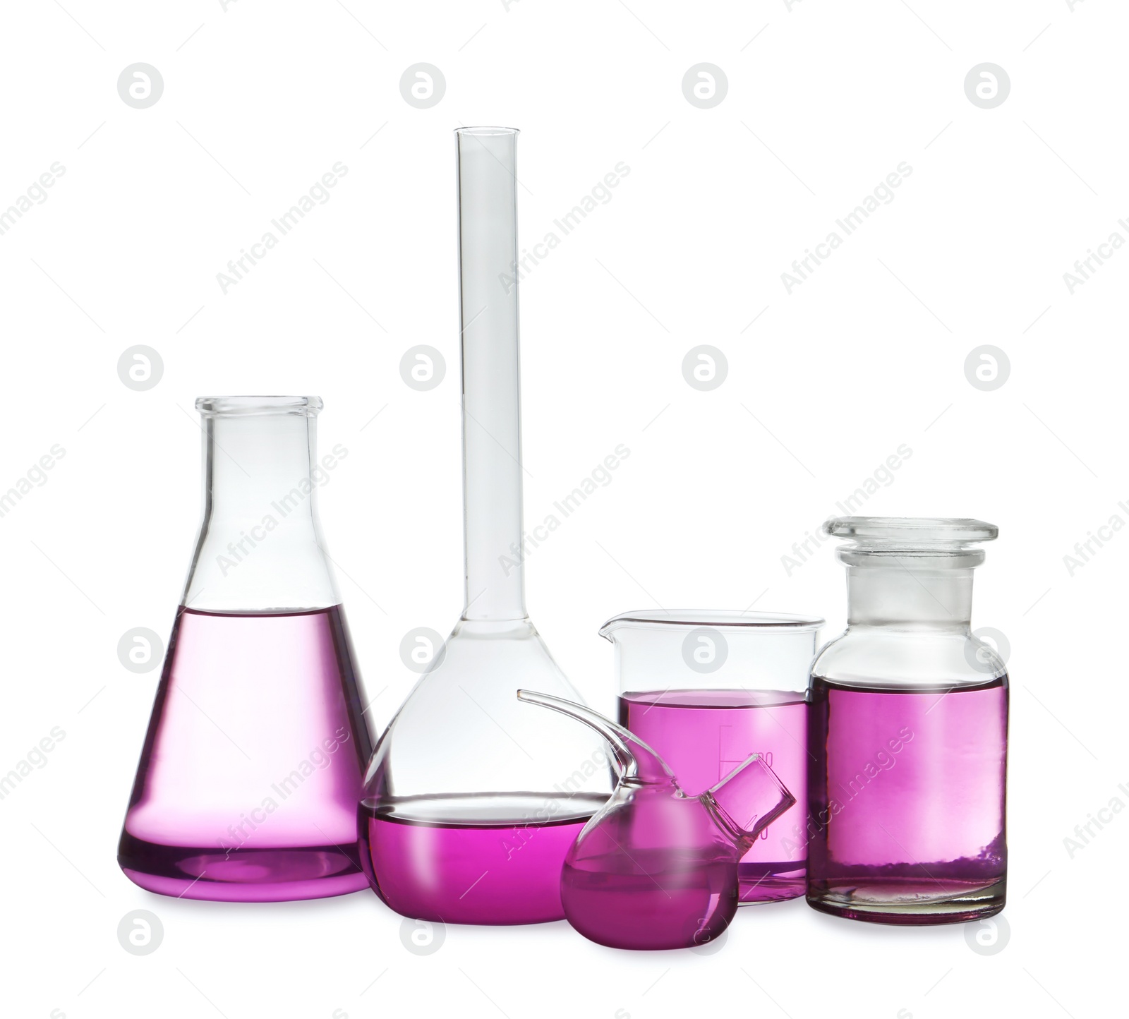 Photo of Laboratory glassware with purple liquid on white background