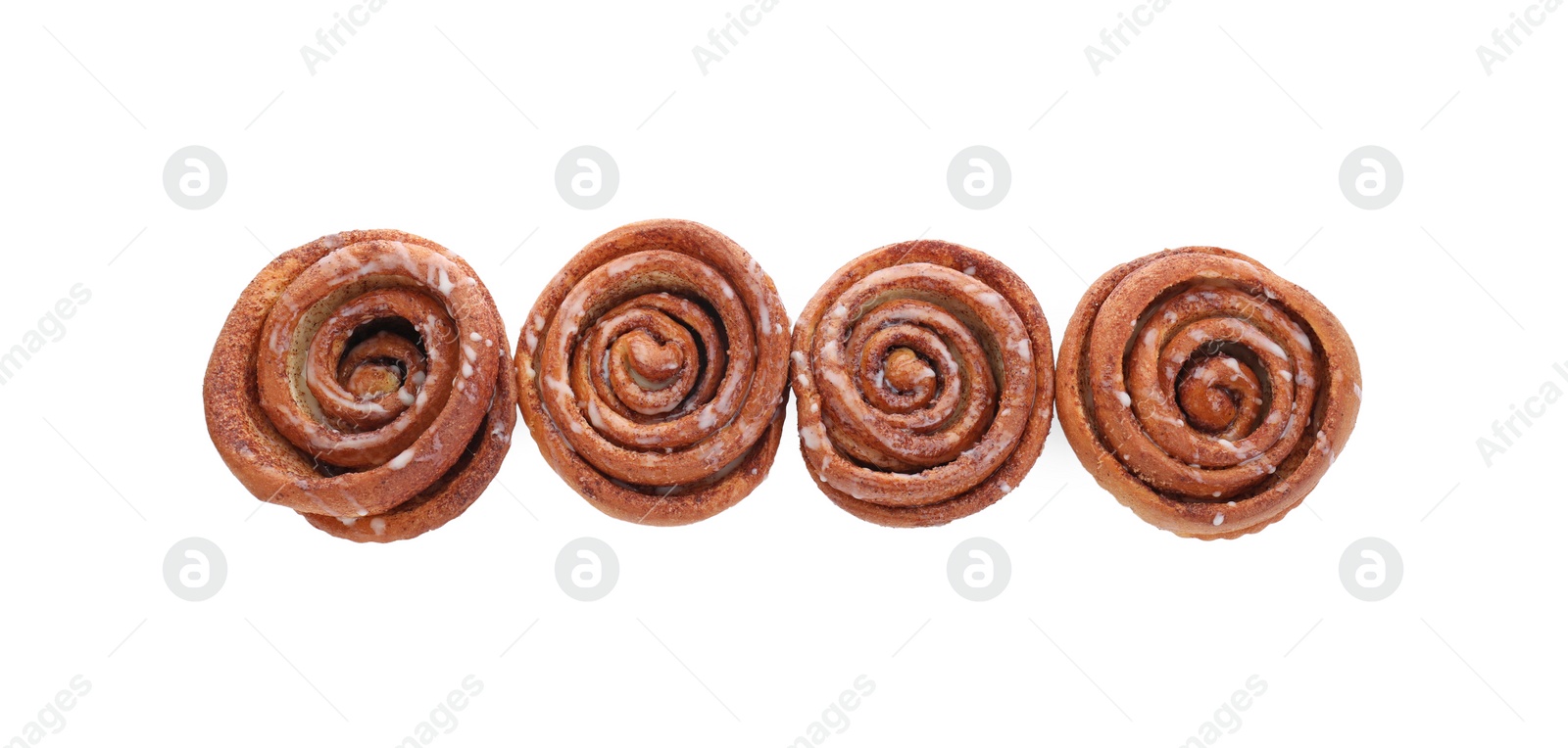 Photo of Tasty cinnamon rolls isolated on white, top view