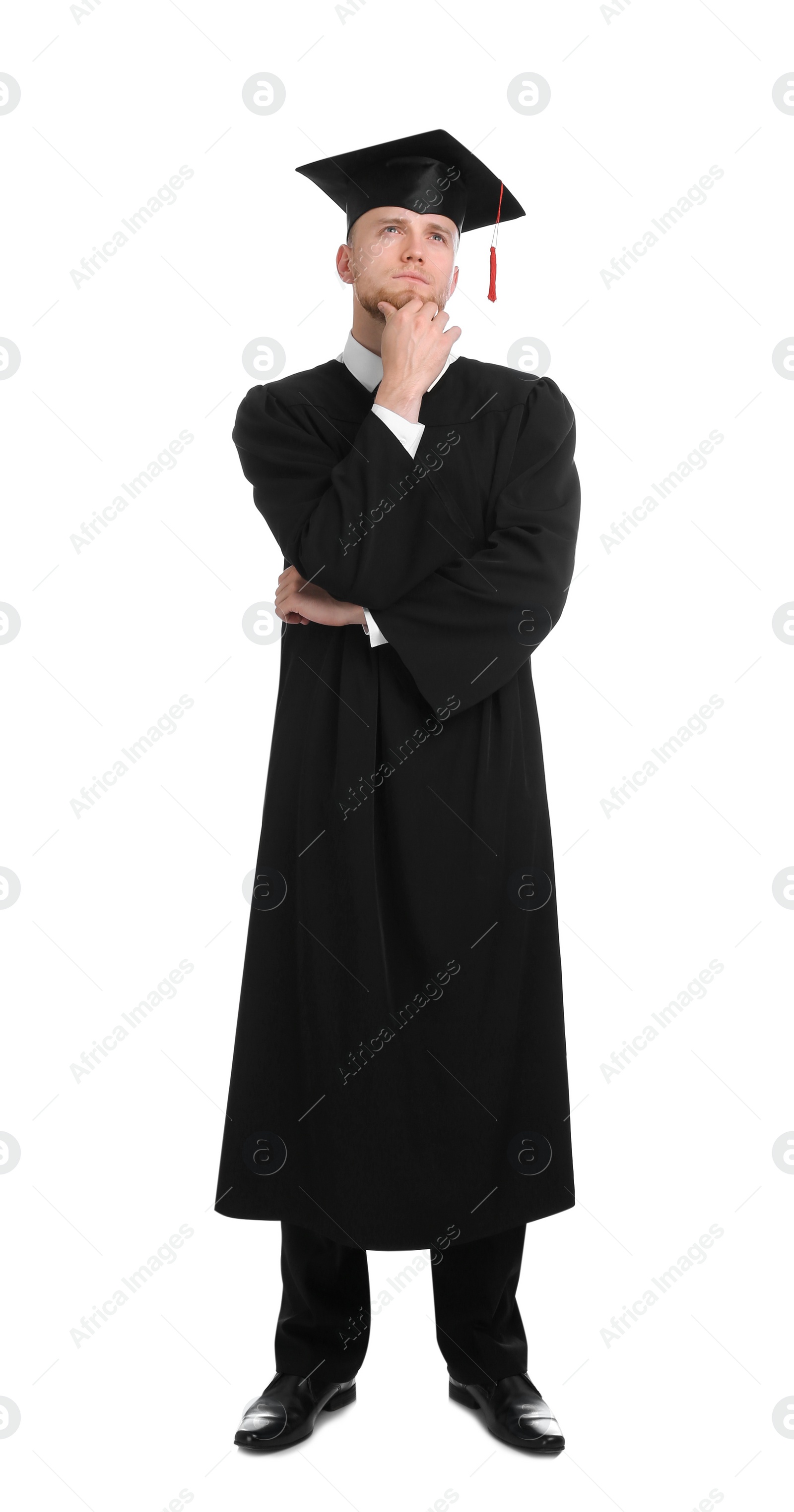 Photo of Happy student wearing graduation hat on white background