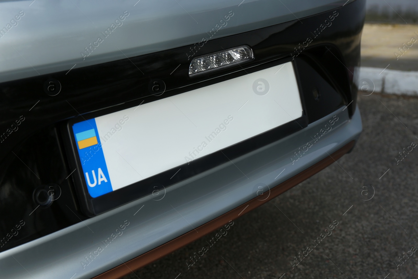 Photo of Car with vehicle registration plate outdoors, closeup