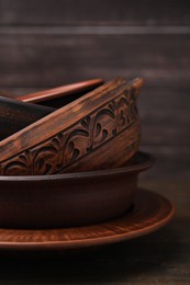 Set of clay dishes on table, closeup. Cooking utensils