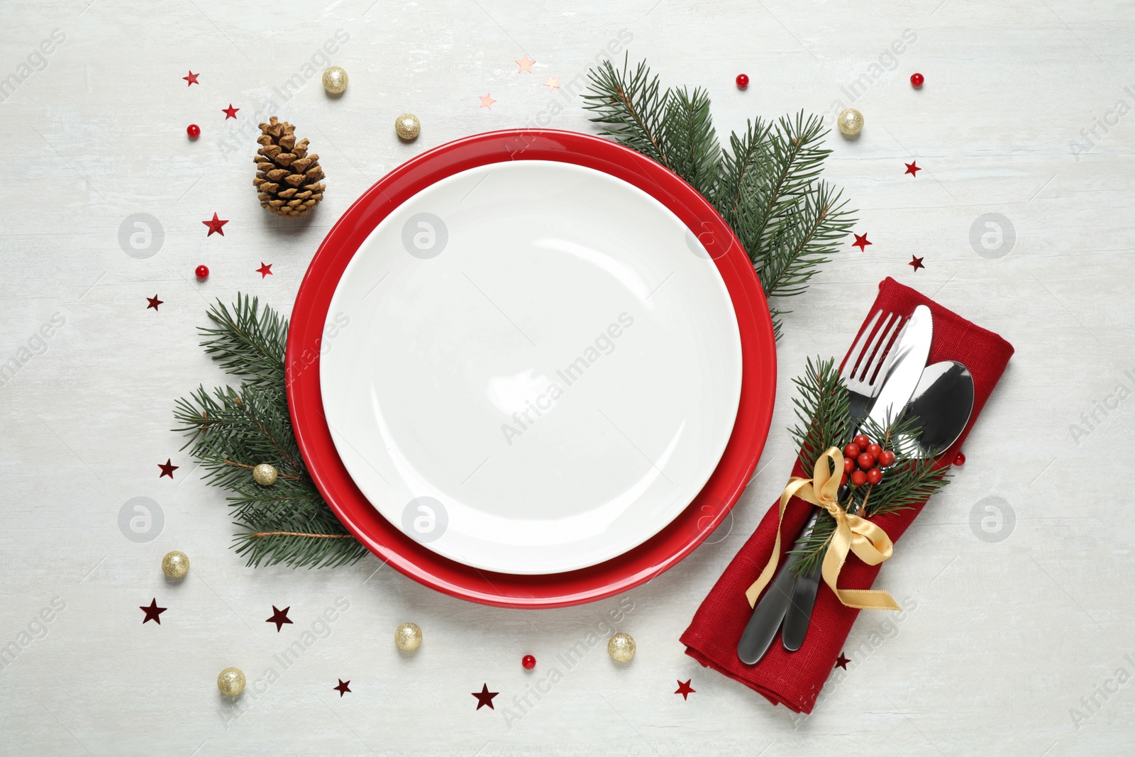 Photo of Christmas table setting on white background, flat lay