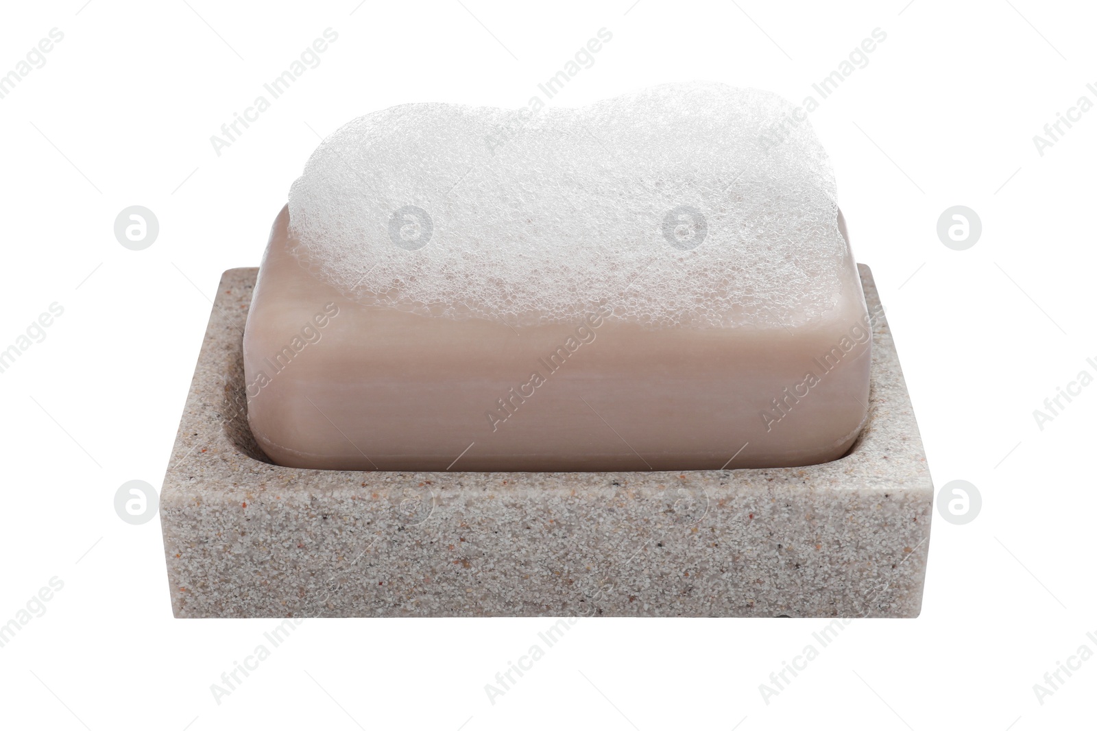 Photo of Soap bar with fluffy foam in holder on white background