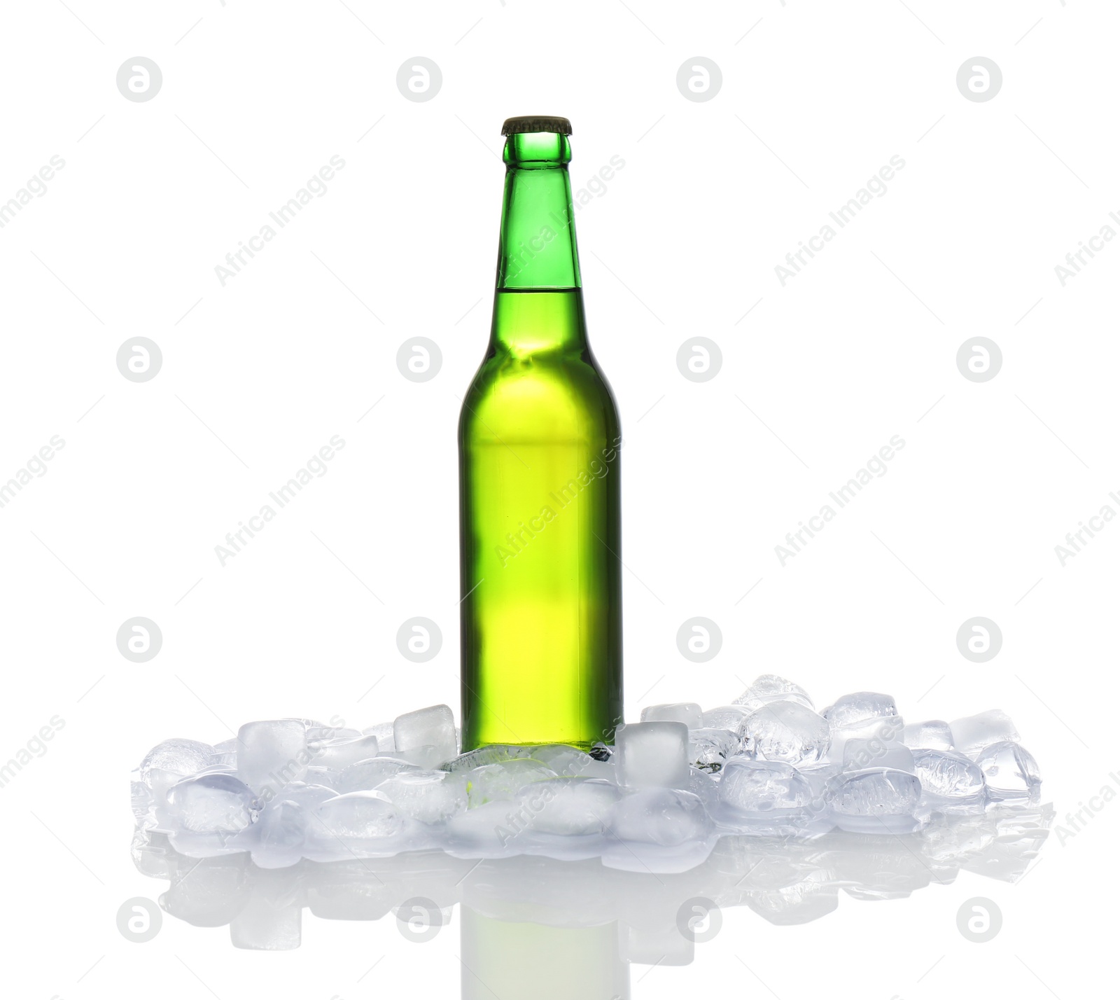 Photo of Bottle of beer and ice cubes on white background