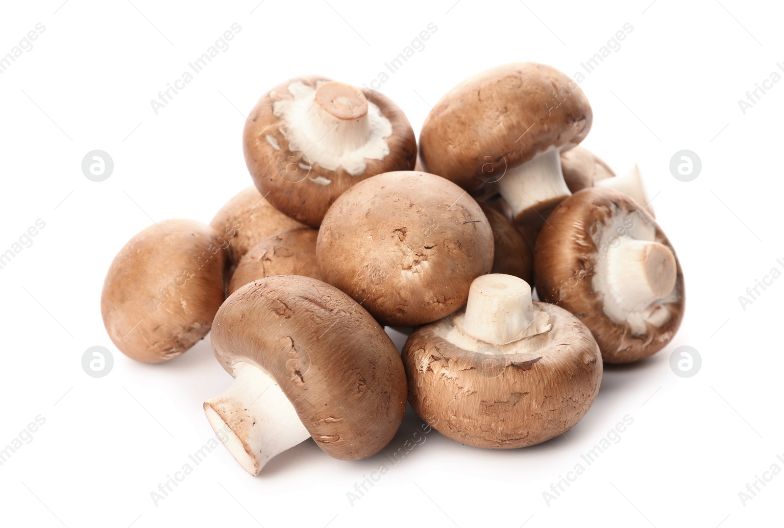 Photo of Fresh champignon mushrooms isolated on white. Healthy food