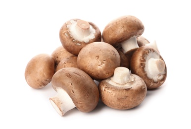 Photo of Fresh champignon mushrooms isolated on white. Healthy food