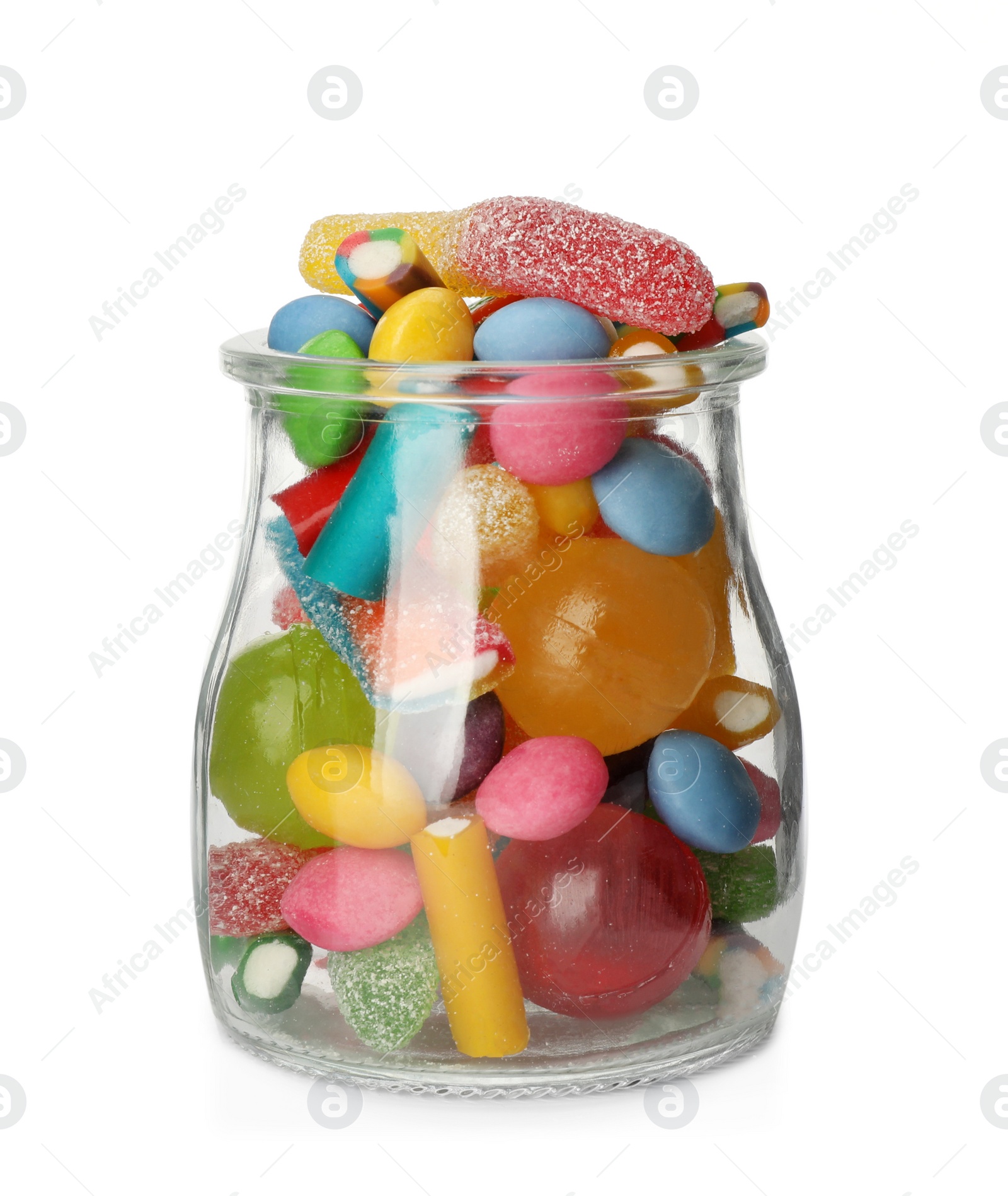 Photo of Many different candies in glass jar isolated on white