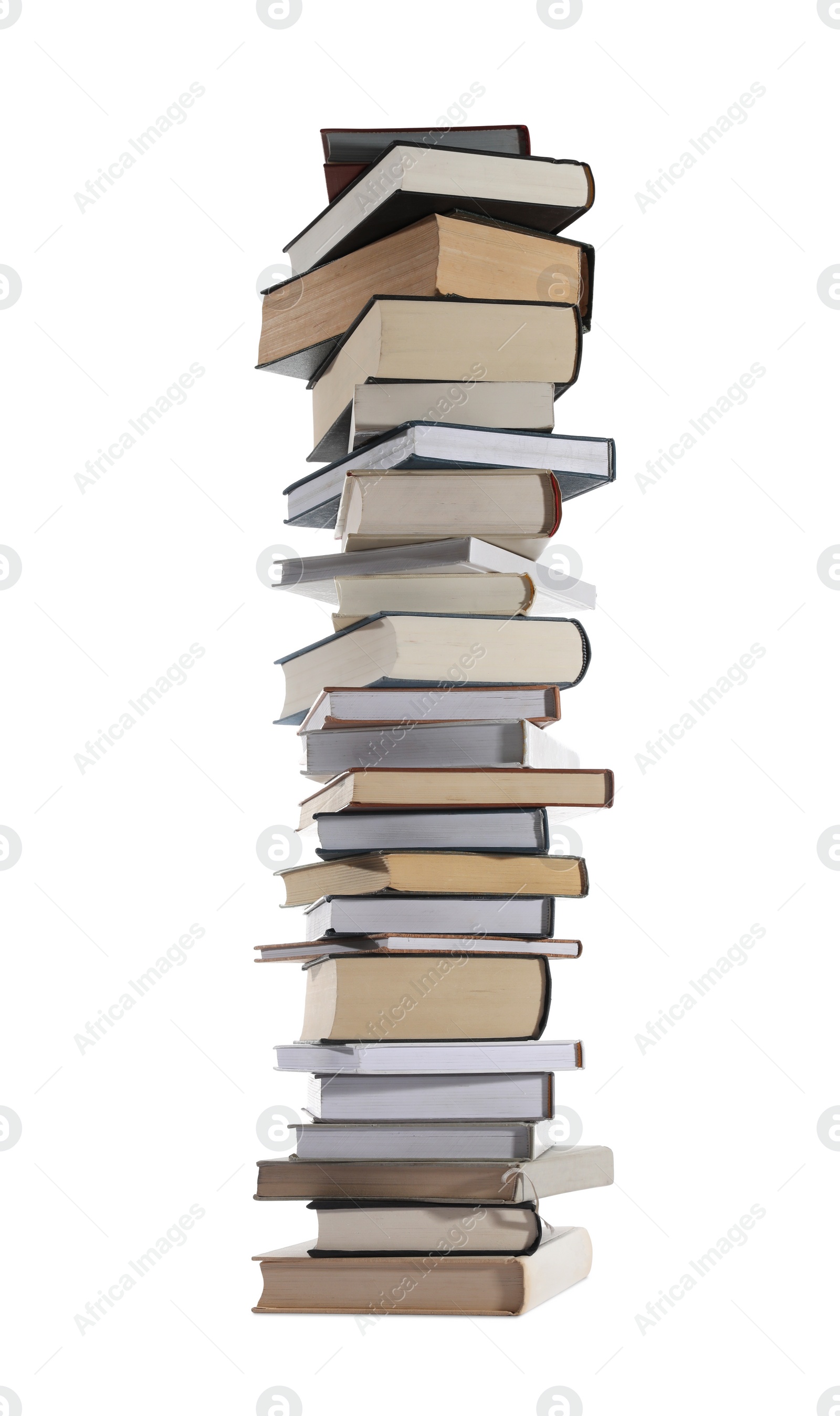 Photo of High stack of many different books isolated on white