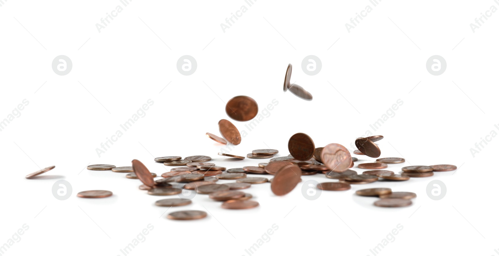 Photo of Coins falling down into pile isolated on white