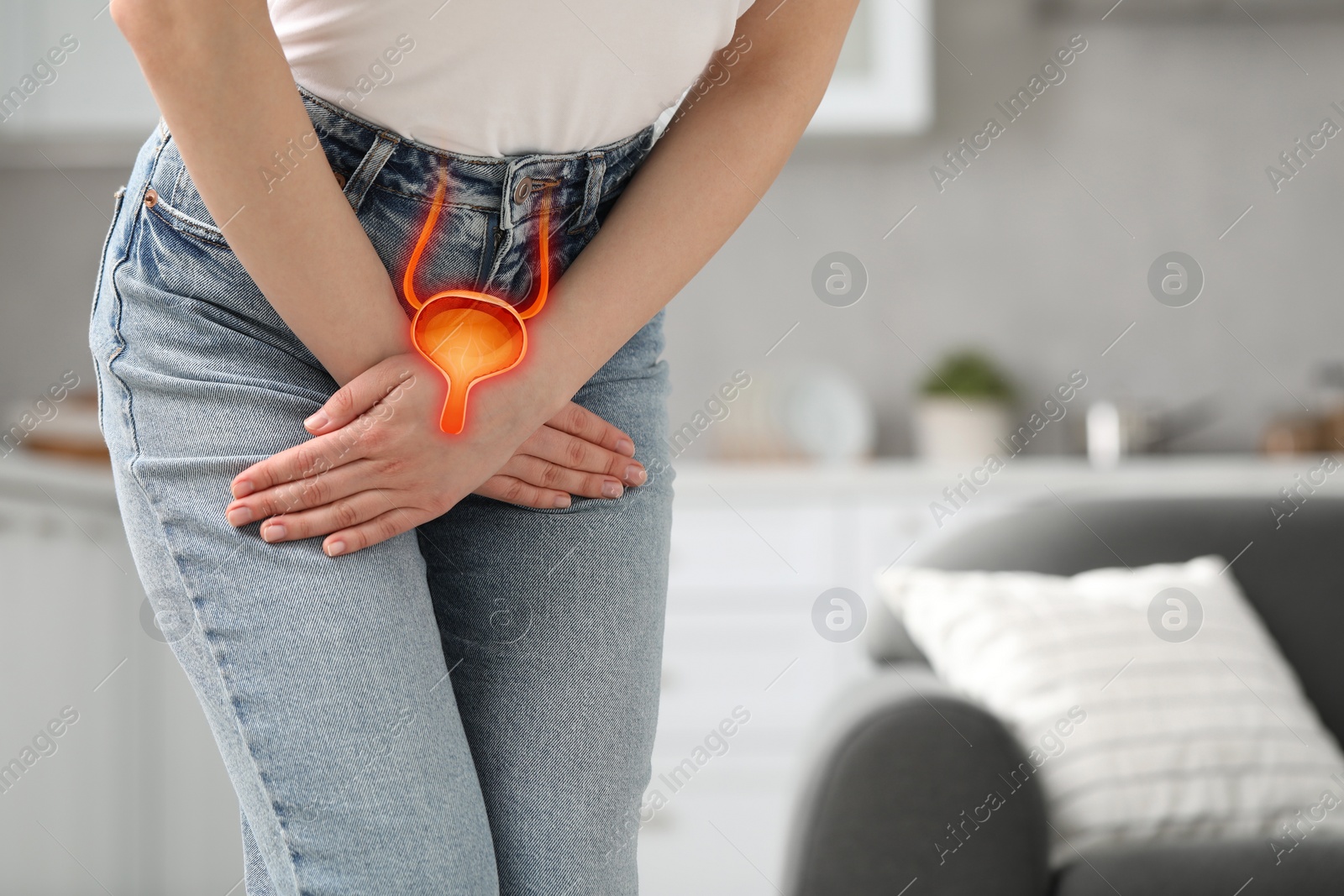 Image of Woman suffering from cystitis at home, closeup. Illustration of urinary system