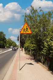Road sign Children outdoors on sunny day