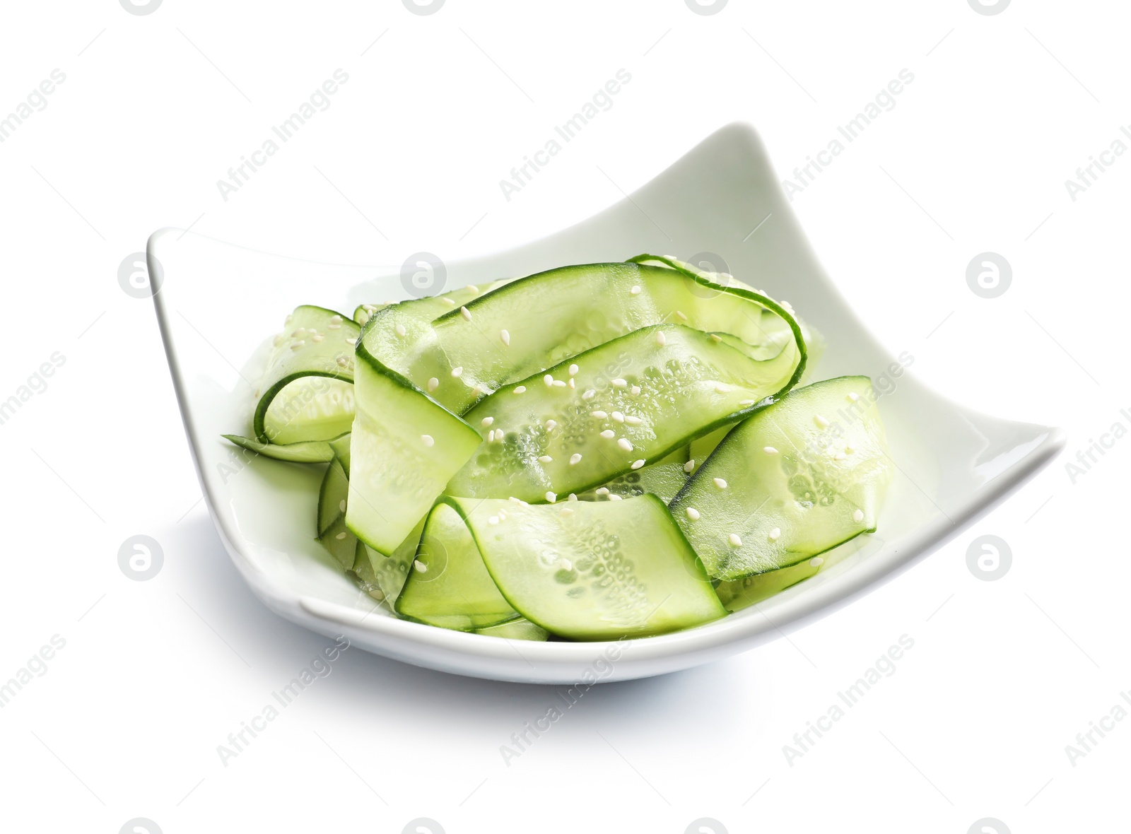 Photo of Plate with delicious cucumber salad on white background