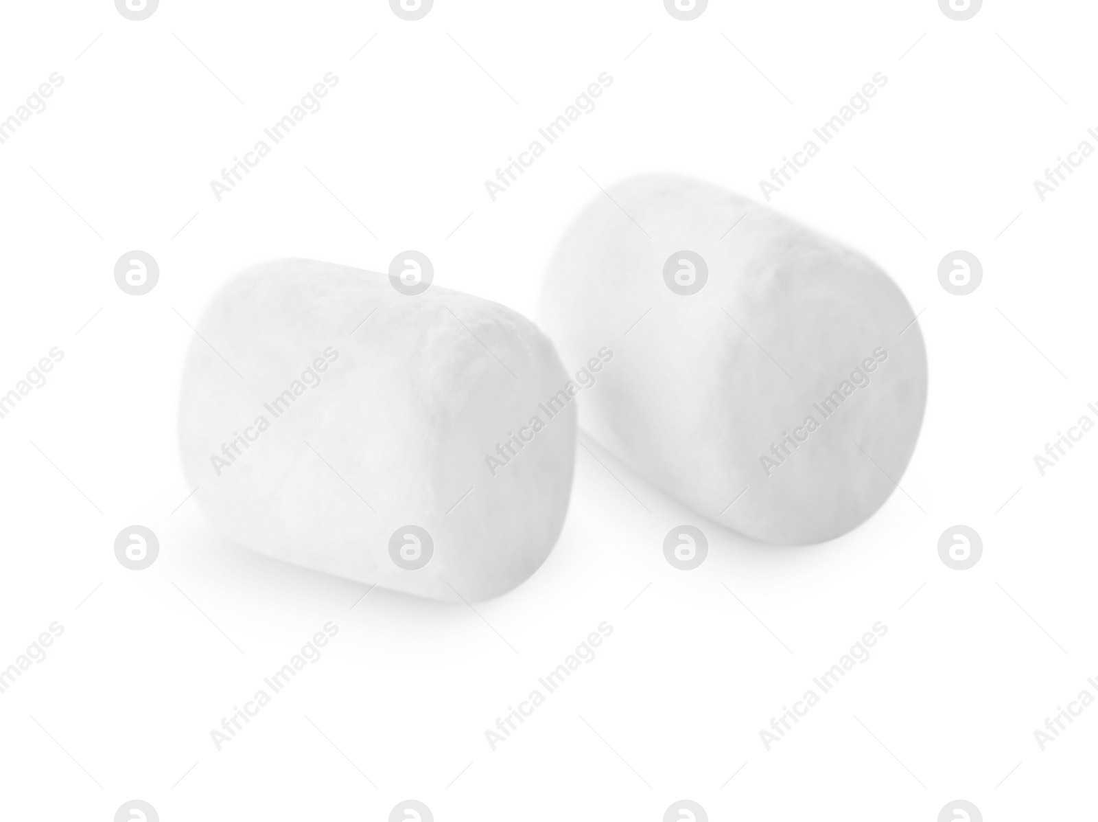 Photo of Delicious sweet puffy marshmallows isolated on white