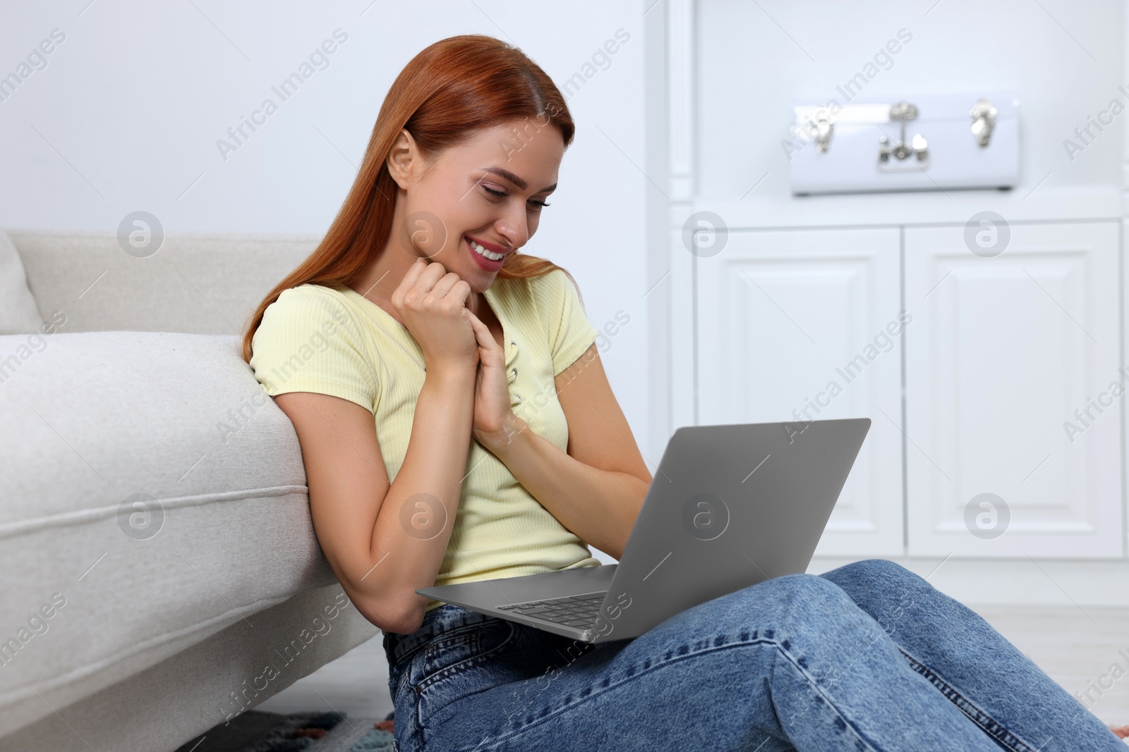 Photo of Woman having video chat via laptop at home