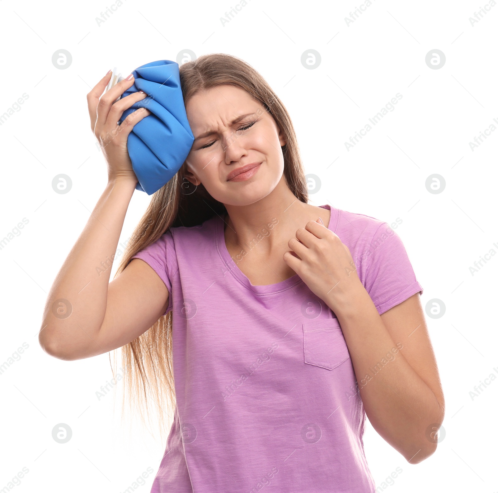 Photo of Unhappy woman using cold pack to cure headache on white background