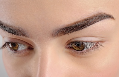 Photo of Beautiful woman with perfect eyebrows, closeup