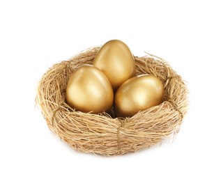 Shiny golden eggs in nest on white background