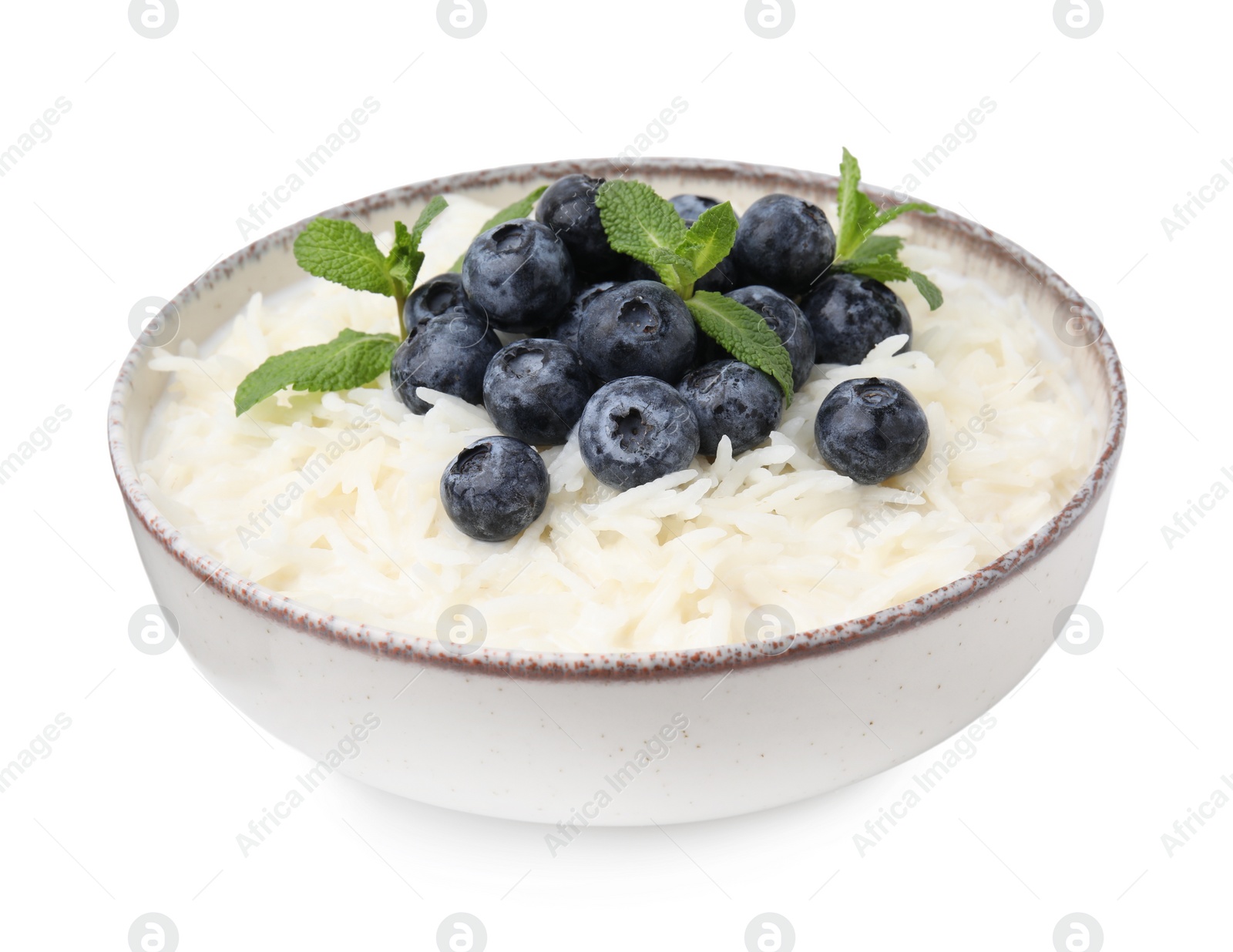 Photo of Delicious rice porridge with blueberries and mint isolated on white