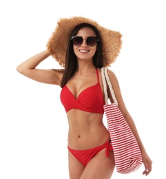 Pretty sexy woman with slim body in stylish red bikini on white background