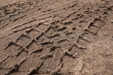 Photo of Texture of wet ground surface as background, closeup