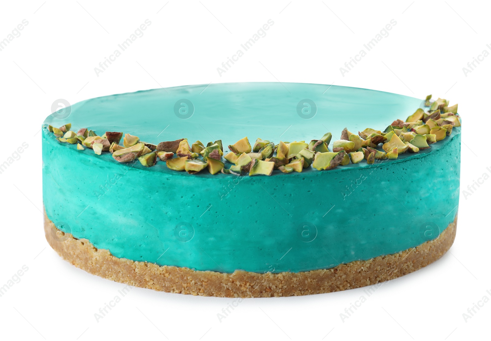 Photo of Delicious spirulina cheesecake decorated with pistachios isolated on white