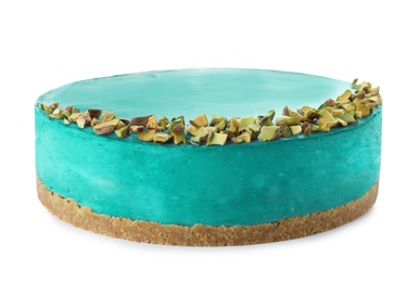 Photo of Delicious spirulina cheesecake decorated with pistachios isolated on white