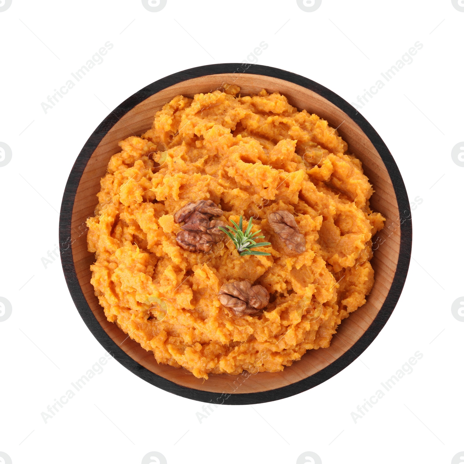 Photo of Bowl with mashed sweet potatoes on white background, top view