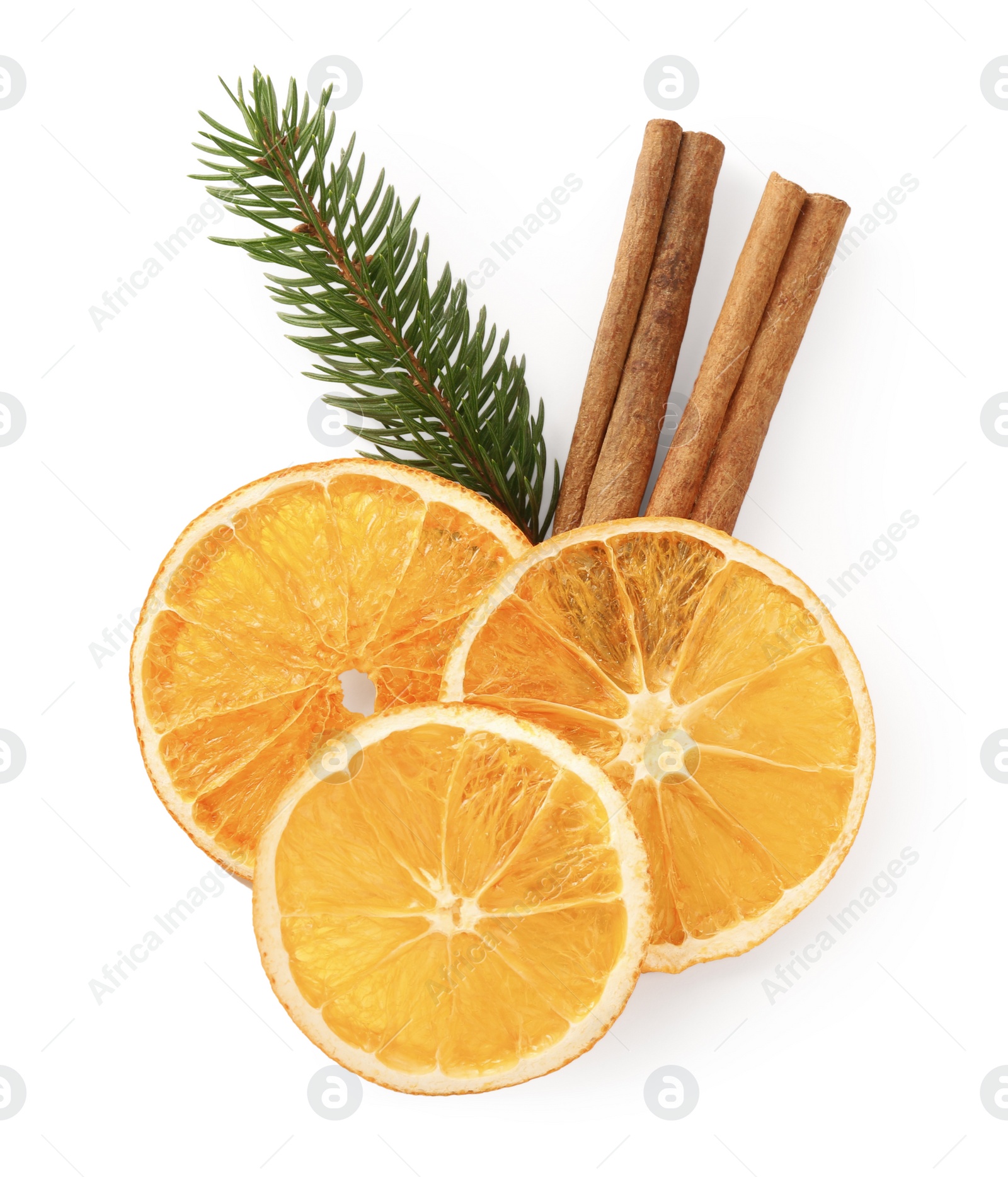 Photo of Dry orange slices, fir branch and cinnamon sticks isolated on white, top view