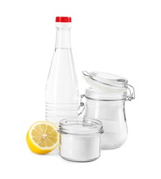 Photo of Baking soda, lemon and vinegar isolated on white