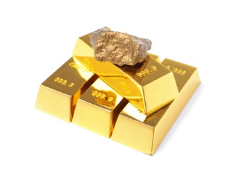 Gold nugget and ingots on white background