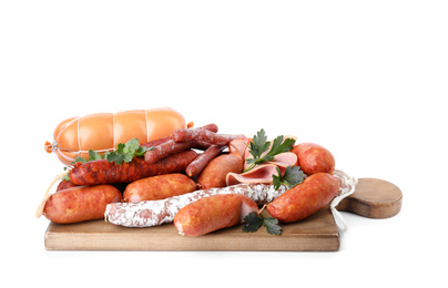 Photo of Wooden board with different tasty sausages isolated on white