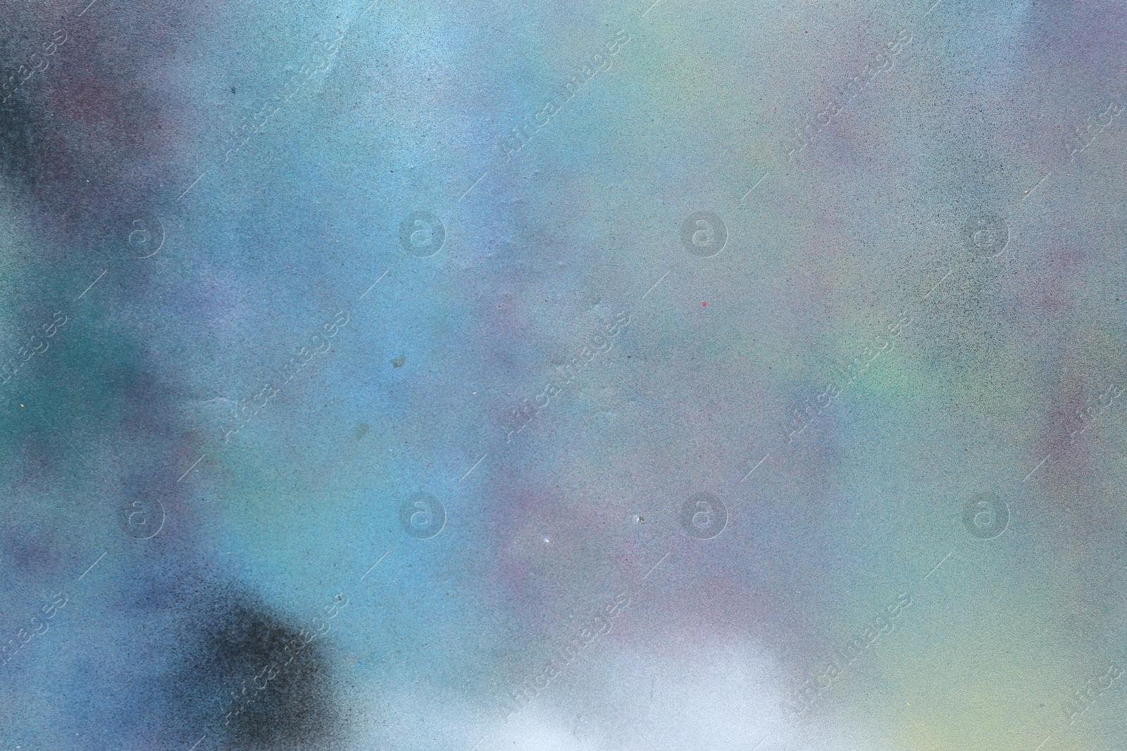 Photo of Texture of abstract spray paint as background, top view