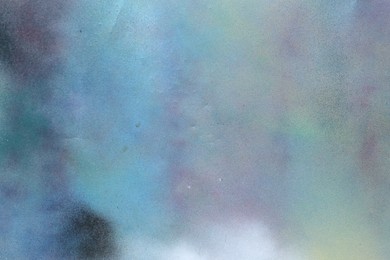 Photo of Texture of abstract spray paint as background, top view