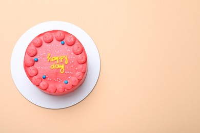 Photo of Cute bento cake with tasty cream on beige background, top view. Space for text