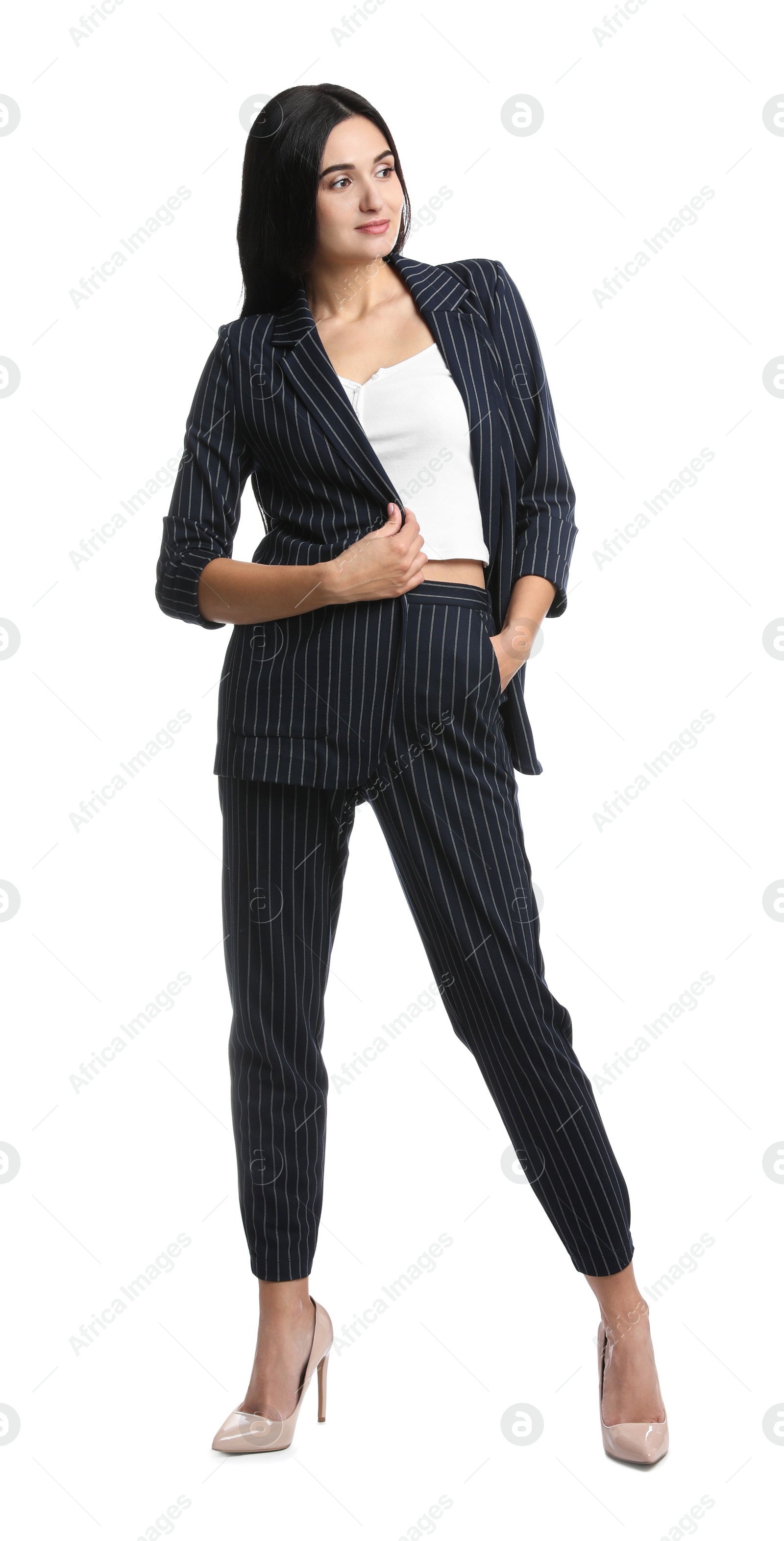 Photo of Full length portrait of beautiful woman in formal suit on white background. Business attire