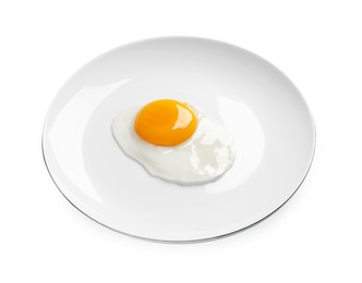 Photo of Plate with tasty fried egg isolated on white