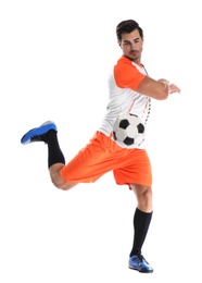 Young man playing football on white background