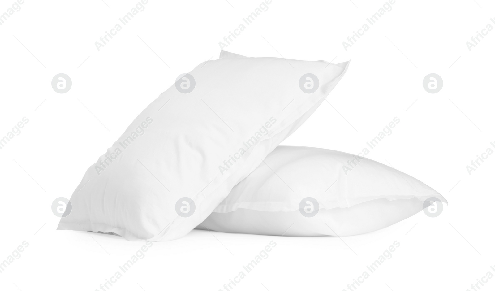 Photo of Two new soft pillows isolated on white