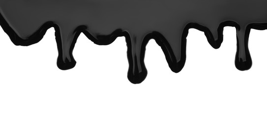 Photo of Black viscous liquid flowing on white background