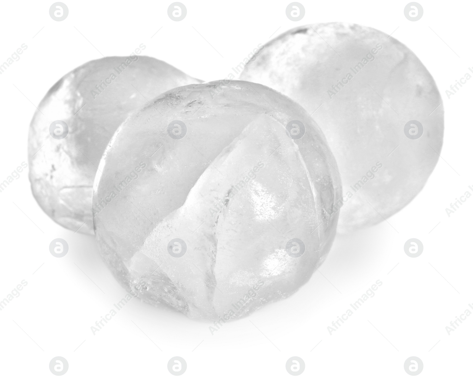 Photo of Many frozen ice balls on white background