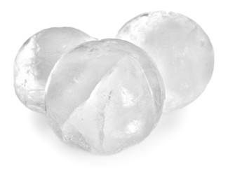 Photo of Many frozen ice balls on white background