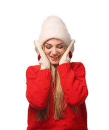 Portrait of emotional young woman in stylish clothes on white background. Winter atmosphere