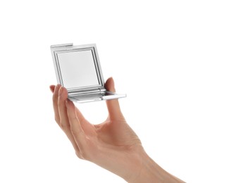 Photo of Woman holding stylish cosmetic pocket mirror on white background, closeup