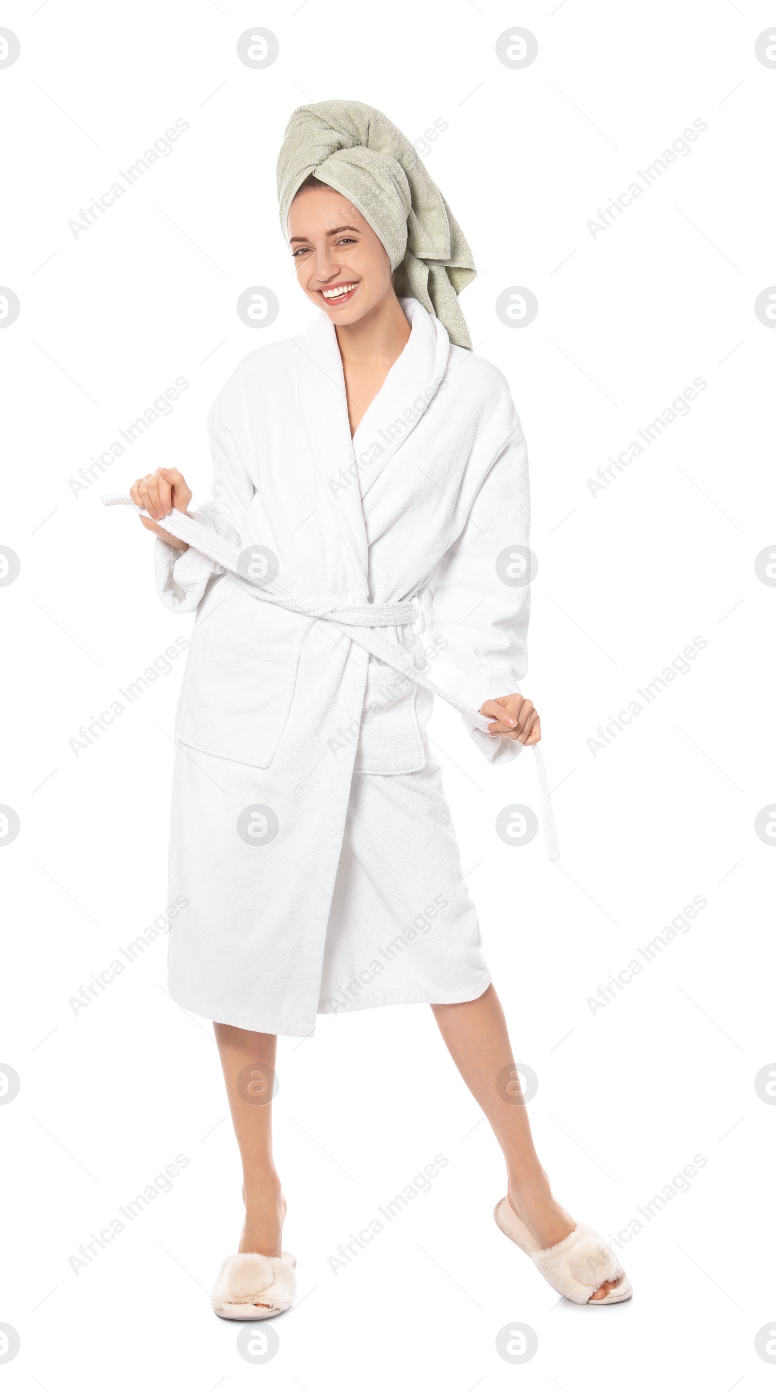 Photo of Beautiful young woman wearing bathrobe on white background