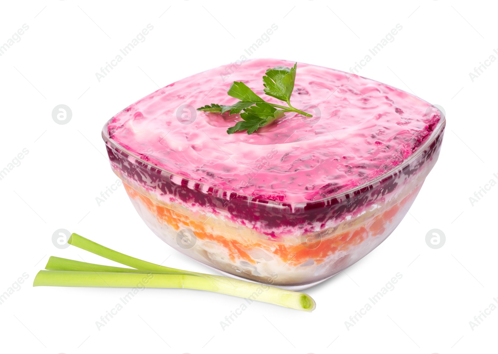 Photo of Herring under fur coat isolated on white. Traditional Russian salad